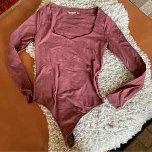 Long sleeve body cut with sweetheart neck line